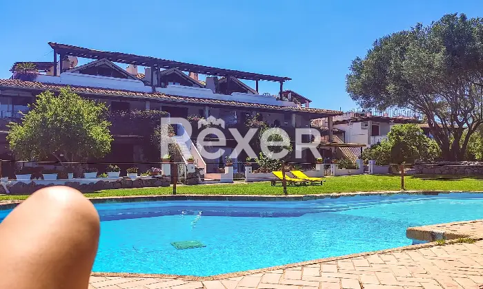 Rexer-Olbia-Attico-vista-mare-in-piccolo-borgo-con-piscina-Terrazzo