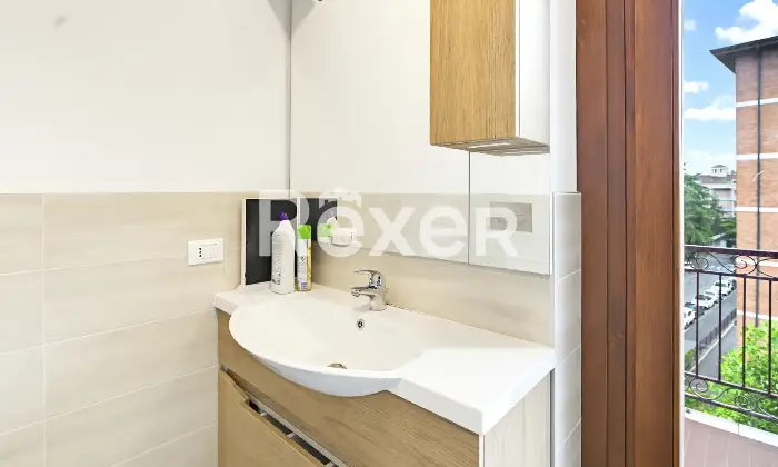 Rexer-Brescia-Quadrilocale-piano-alto-con-box-auto-Altro