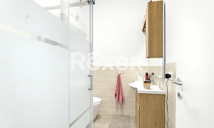 Rexer-Brescia-Quadrilocale-piano-alto-con-box-auto-Altro