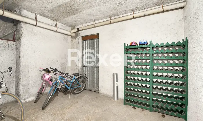 Rexer-Brescia-Quadrilocale-piano-alto-con-box-auto-Altro