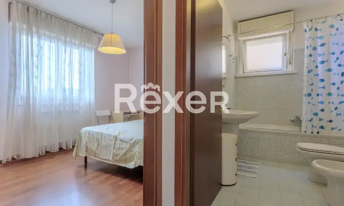 Rexer-Gorle-Bilocale-con-ampio-terrazzo-box-e-ascensore-Altro