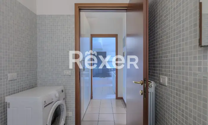 Rexer-Gorle-Bilocale-con-ampio-terrazzo-box-e-ascensore-Altro