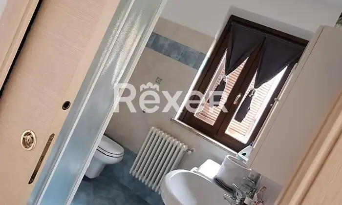Rexer-Calolziocorte-Elegante-Appartamento-in-classe-B-due-livelli-ascensore-box-Scala