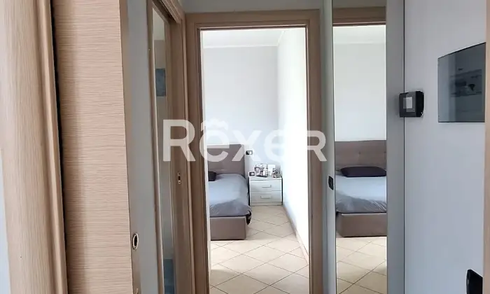 Rexer-Calolziocorte-Elegante-Appartamento-in-classe-B-due-livelli-ascensore-box-Corridoio