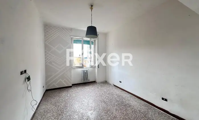 Rexer-Roma-Ampio-Bilocale-Piano-Alto-con-balcone-Camera-da-letto-matrimoniale