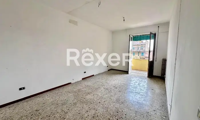 Rexer-Roma-Ampio-Bilocale-Piano-Alto-con-balcone-Camera-da-letto-matrimoniale