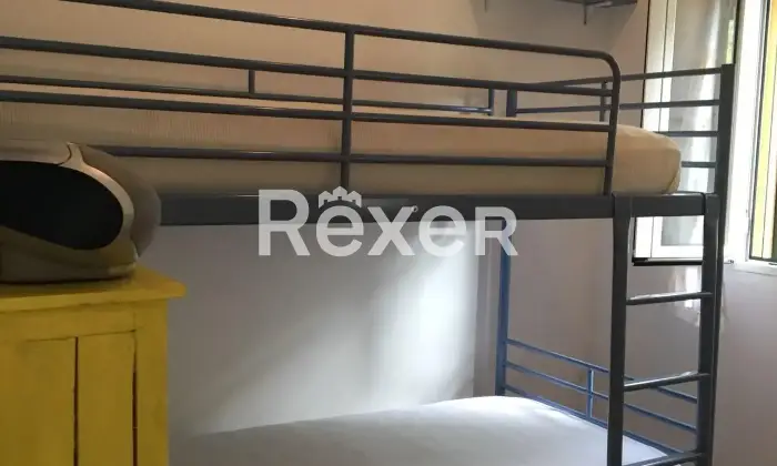 Rexer-Campo-nellElba-Appartamento-con-terrazza-vista-mare-CameraDaLetto
