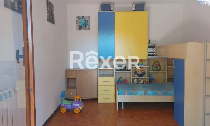 Rexer-Sabaudia-Apartment-with-a-garden-in-Sabaudia-Camera-da-letto