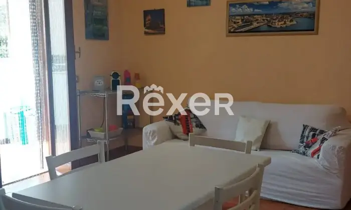 Rexer-Sabaudia-Apartment-with-a-garden-in-Sabaudia-Sala