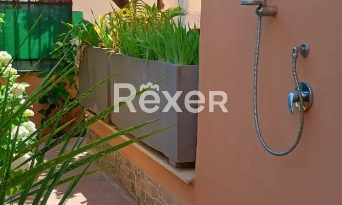 Rexer-Sabaudia-Apartment-with-a-garden-in-Sabaudia-Giardino