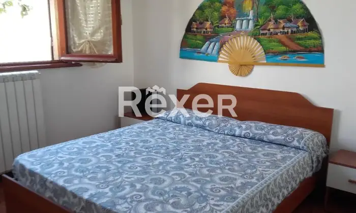 Rexer-Sabaudia-Apartment-with-a-garden-in-Sabaudia-CameraDaLetto