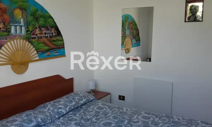 Rexer-Sabaudia-Apartment-with-a-garden-in-Sabaudia-CameraDaLetto