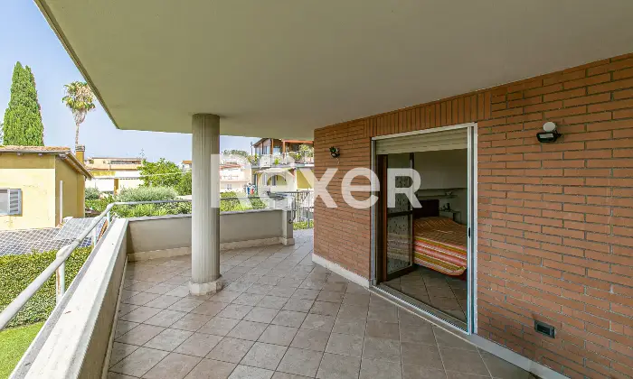 Rexer-Roma-Villa-a-schiera-angolare-su-tre-livelli-con-ampio-giardino-terrazzi-e-Box-auto-Altro
