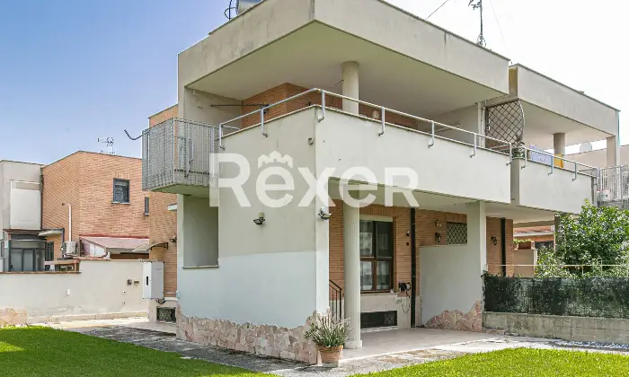 Rexer-Roma-Villa-a-schiera-angolare-su-tre-livelli-con-ampio-giardino-terrazzi-e-Box-auto-Altro