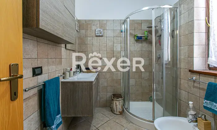 Rexer-Roma-Villa-a-schiera-angolare-su-tre-livelli-con-ampio-giardino-terrazzi-e-Box-auto-Altro