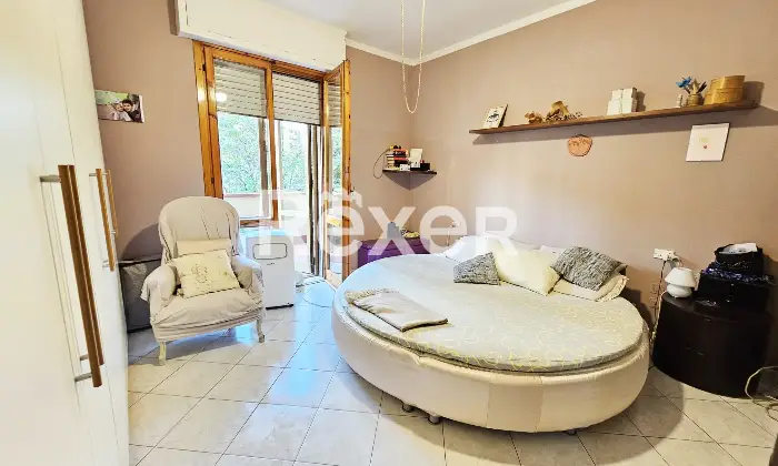 Rexer-Campi-Bisenzio-Ampio-trilocale-con-terrazzo-vivibile-e-garage-Camera-da-letto-matrimoniale