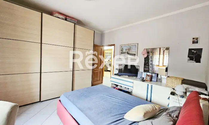 Rexer-Campi-Bisenzio-Ampio-trilocale-con-terrazzo-vivibile-e-garage-Camera-da-letto