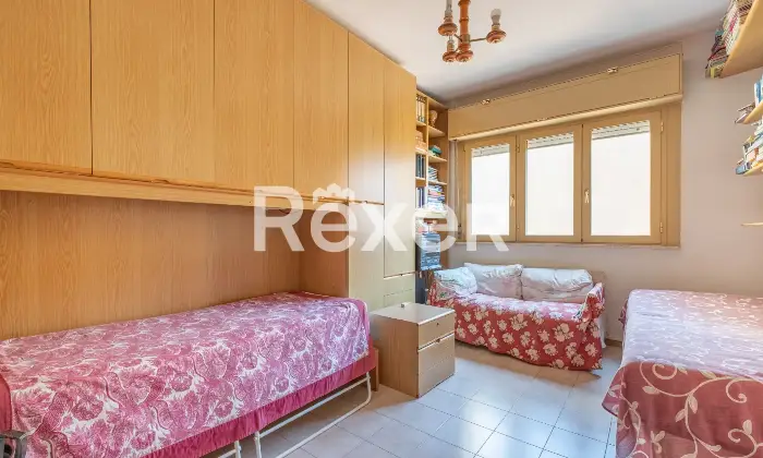 Rexer-Roma-Appartamento-in-Via-Byron-con-posto-auto-e-cantina-Camera