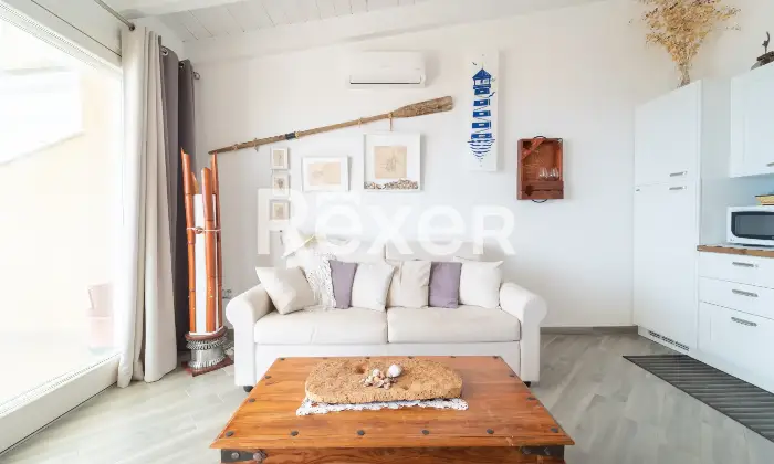 Rexer-Paduledda-Appartamento-panoramico-con-terrazzo-e-piscina-condominiale-Altro