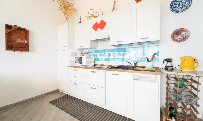 Rexer-Paduledda-Appartamento-panoramico-con-terrazzo-e-piscina-condominiale-Altro