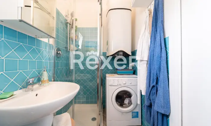 Rexer-Paduledda-Appartamento-panoramico-con-terrazzo-e-piscina-condominiale-Altro