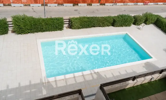 Rexer-Paduledda-Appartamento-panoramico-con-terrazzo-e-piscina-condominiale-Altro