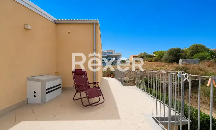 Rexer-Paduledda-Appartamento-panoramico-con-terrazzo-e-piscina-condominiale-Altro