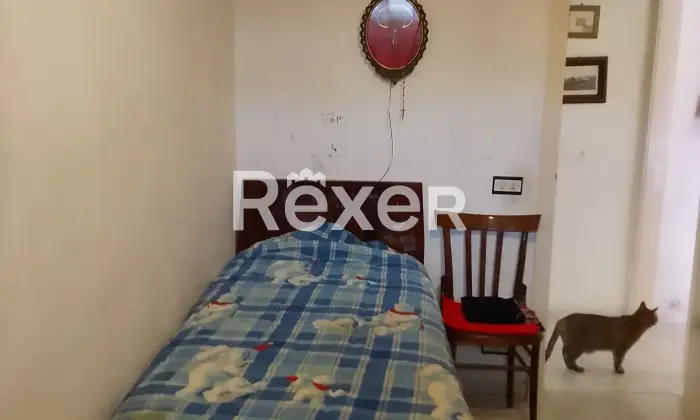 Rexer-Ragusa-Palazzina-indipendente-con-tre-appartamenti-terrazzo-panoramico-e-garage-CameraDaLetto
