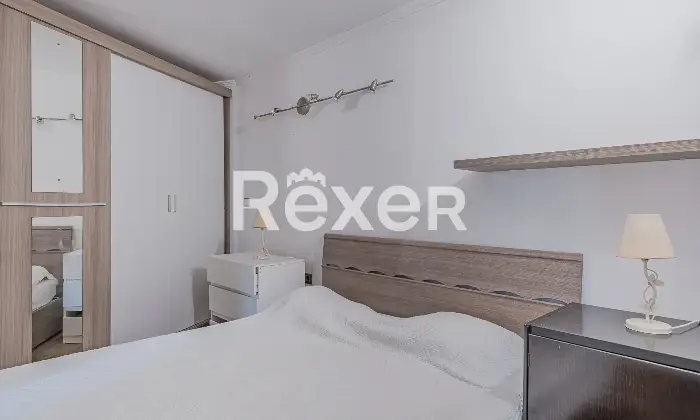 Rexer-Roma-Appartamento-in-Via-Giovanni-Maria-Caretti-Camera-da-letto-matrimoniale