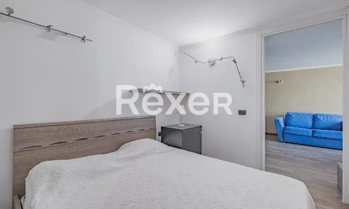 Rexer-Roma-Appartamento-in-Via-Giovanni-Maria-Caretti-Camera-da-letto-matrimoniale