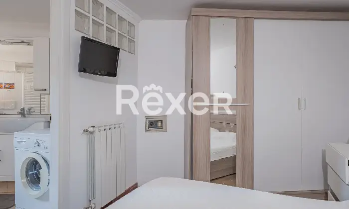 Rexer-Roma-Appartamento-in-Via-Giovanni-Maria-Caretti-Camera-da-letto-matrimoniale