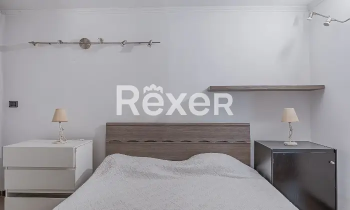 Rexer-Roma-Appartamento-in-Via-Giovanni-Maria-Caretti-Camera-da-letto-matrimoniale
