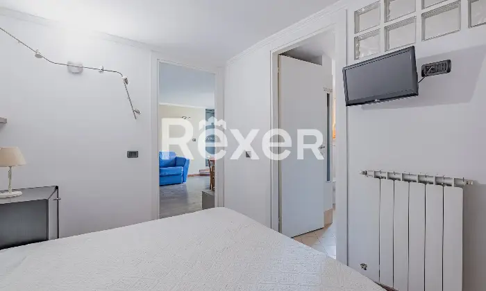 Rexer-Roma-Appartamento-in-Via-Giovanni-Maria-Caretti-Camera-da-letto-matrimoniale