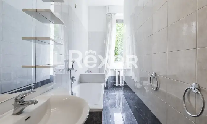 Rexer-Milano-Ampio-appartamento-in-stabile-depoca-Altro