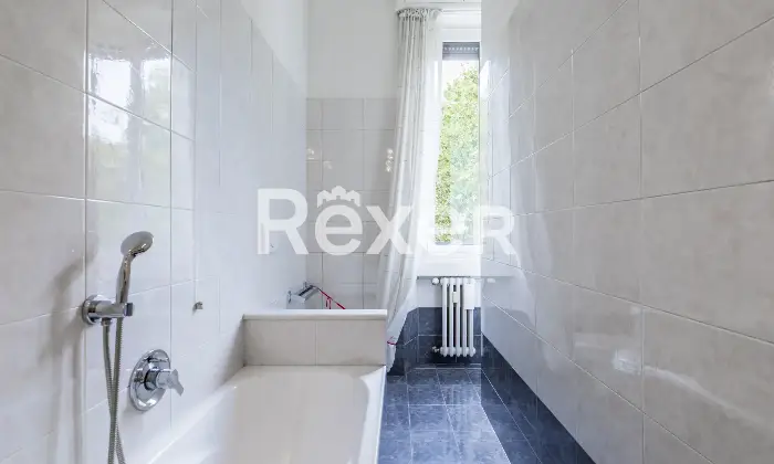 Rexer-Milano-Ampio-appartamento-in-stabile-depoca-Altro