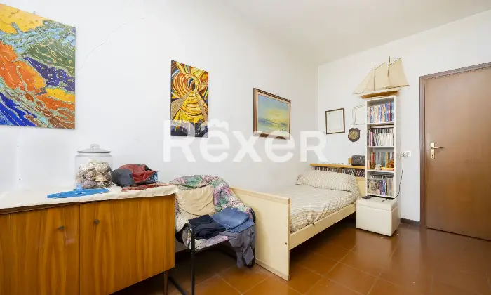 Rexer-Sondrio-Ampio-appartamento-arredato-con-quattro-balconi-box-e-cantina-Camera