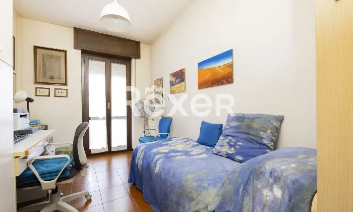 Rexer-Sondrio-Ampio-appartamento-arredato-con-quattro-balconi-box-e-cantina-Camera