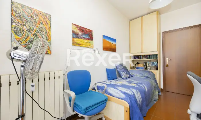 Rexer-Sondrio-Ampio-appartamento-arredato-con-quattro-balconi-box-e-cantina-Camera