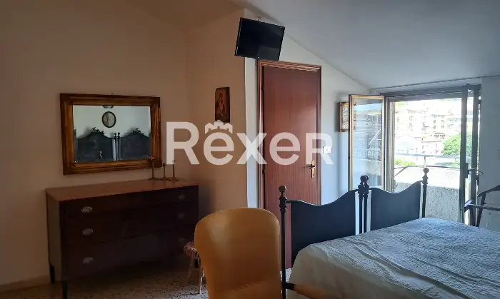 Rexer-Soverato-Trilocale-sopra-CONAD-Camera-da-letto