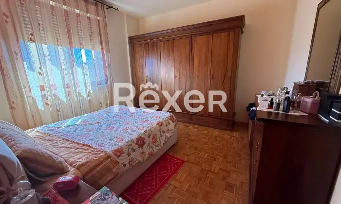 Rexer-Pistoia-Appartamento-al-secondo-piano-con-due-terrazzi-e-garage-Camera-da-letto