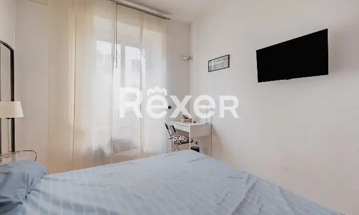 Rexer-Roma-Appartamento-bilocale-al-piano-rialzato-Camera-da-letto-matrimoniale