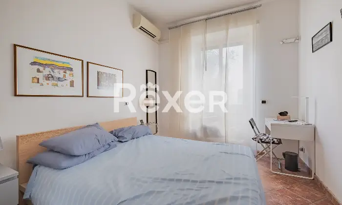 Rexer-Roma-Appartamento-bilocale-al-piano-rialzato-Camera-da-letto-matrimoniale
