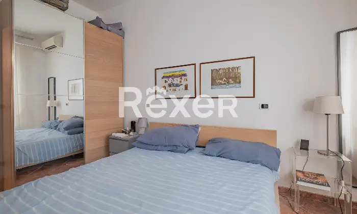 Rexer-Roma-Appartamento-bilocale-al-piano-rialzato-Camera-da-letto-matrimoniale