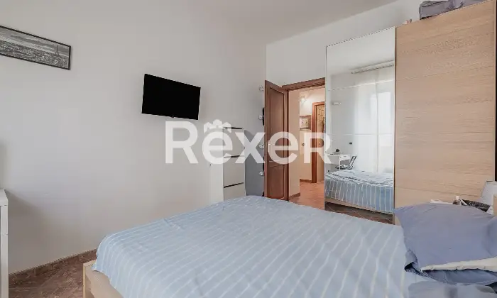Rexer-Roma-Appartamento-bilocale-al-piano-rialzato-Camera-da-letto-matrimoniale