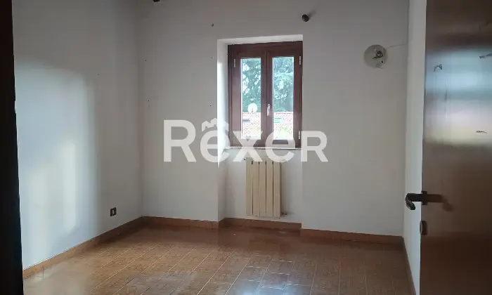 Rexer-Montorfano-Appartamento-con-box-auto-CameraDaLetto