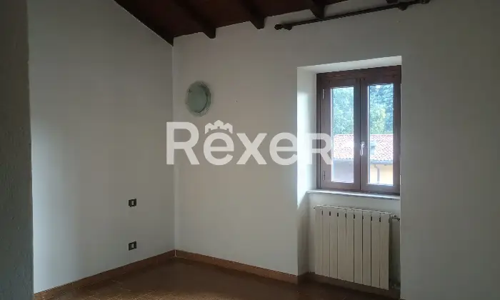 Rexer-Montorfano-Appartamento-con-box-auto-CameraDaLetto