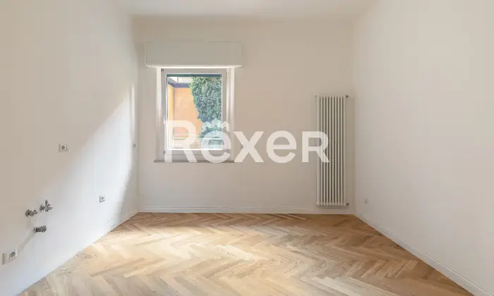 Rexer-Bologna-Elegante-appartamento-ristrutturato-con-camere-da-letto-e-posto-auto-condominiale-Altro