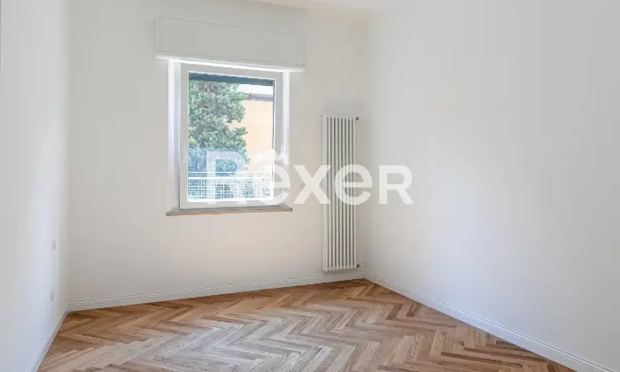 Rexer-Bologna-Elegante-appartamento-ristrutturato-con-camere-da-letto-e-posto-auto-condominiale-Altro