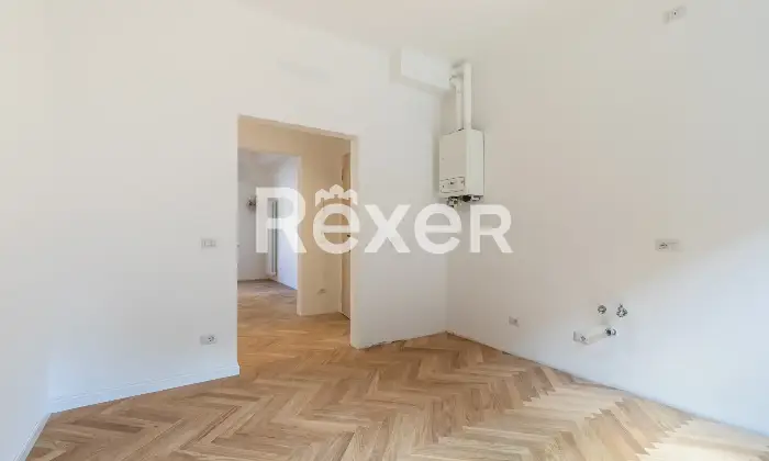 Rexer-Bologna-Elegante-appartamento-ristrutturato-con-camere-da-letto-e-posto-auto-condominiale-Altro