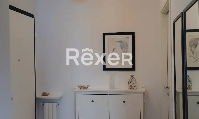 Rexer-Olgiate-Comasco-Trilocale-con-doppi-servizi-e-garage-Ingresso